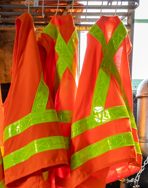 High-visibility safety vests used for every paragliding flight