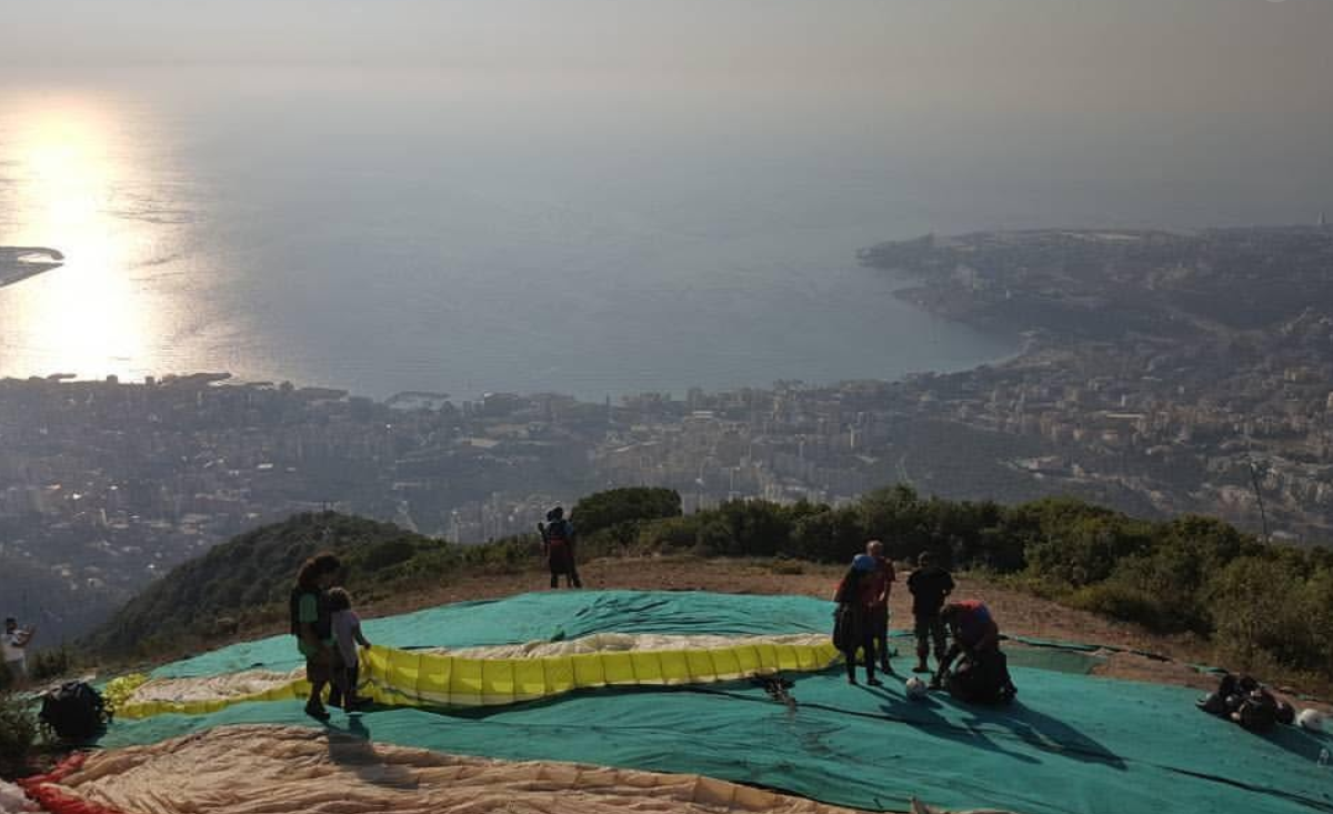Paragliding launch site above Jounieh Bay at sunset